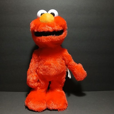 Sesame Street Elmo Slide Singing and Dancing 14-inch Plush Spanish