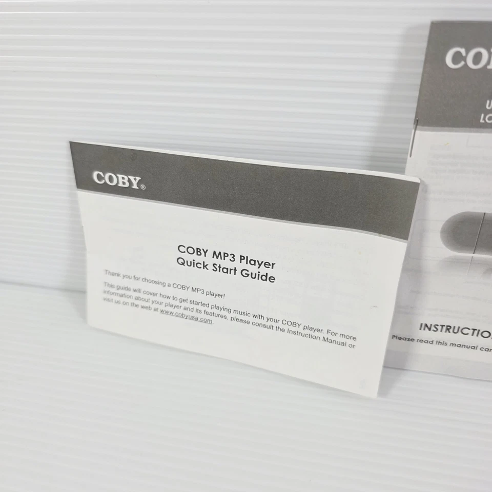 Reproductor de audio MP3 Coby MP-C855 ( 512 MB) sintonizador FM USB 240 canciones negro - probado Foto 4 de 4