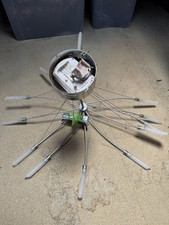2 modern sputnik-style chandelier featuring an electronic transformer.