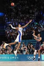 Stephen Curry Of The US Shoots Over Victor Wembanyama Sports - POSTER (ALL SIZE)