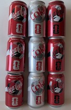 9 12oz. COKE CANS ( FIFA WORLD CUP) EMPTY BOTTOM OPENED