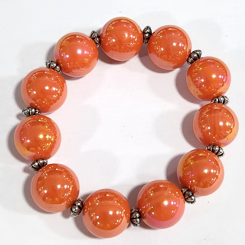 QVC Dark Iridescent Orange Bead Stretch Bracelet Silvertone