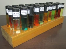 WHOLESALE-OIL KING FRAGRANCE OIL- 100 ROLL-ONS- POPULAR SCENTS- BLOCK DISPLAY.