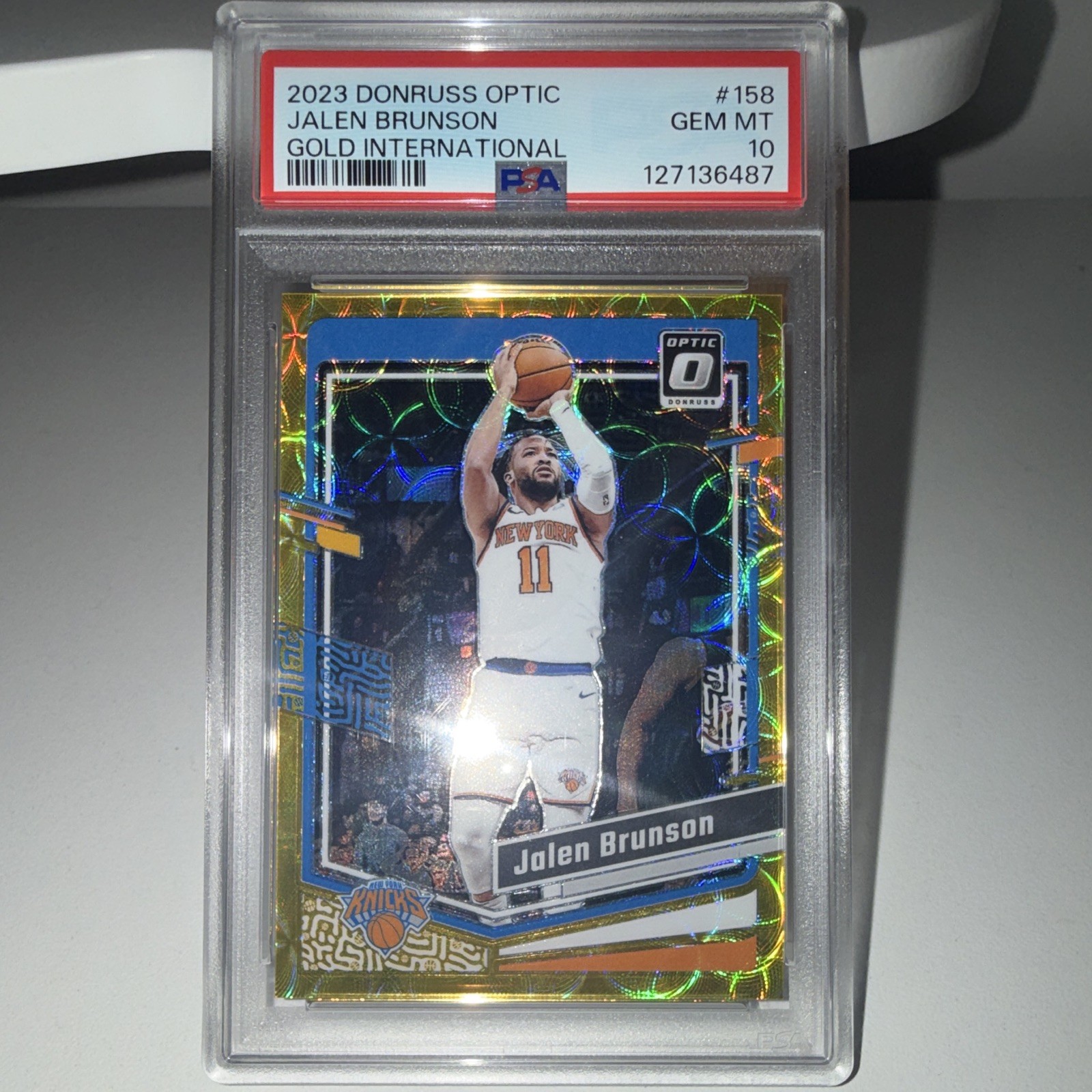 Panini 2023-24 Donruss Optic Jalen Brunson Int’l Gold Prizm 8/10 #158 PSA 10