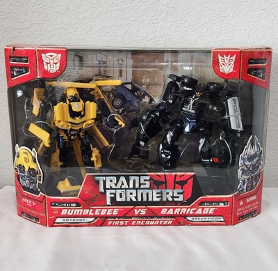 NIB Transformers First Encounter Bumblebee vs Barricade with Automorph Tech MINT