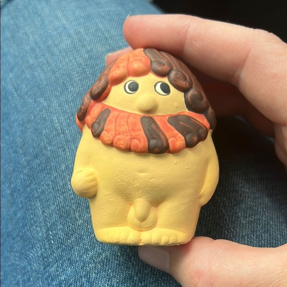 Mid-century Boltze Adam figurine — the kind of gloriously strange kitsch that stops guests dead in their tracks.