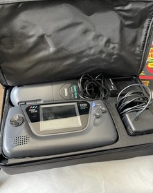 Sega Game Gear System- Console + 21 Games + Genie + Case and Accessories Works