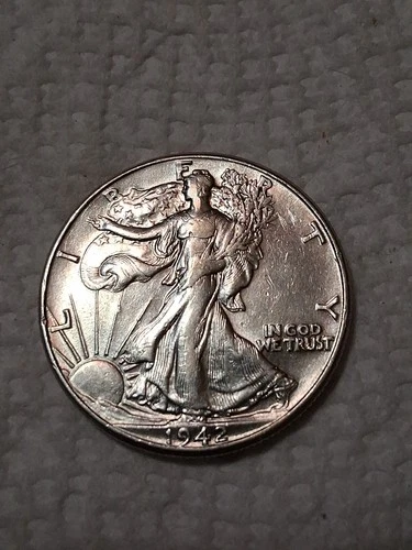 1942 Walking Liberty Half Dollar In F To VF Condition In My Opinion. #410