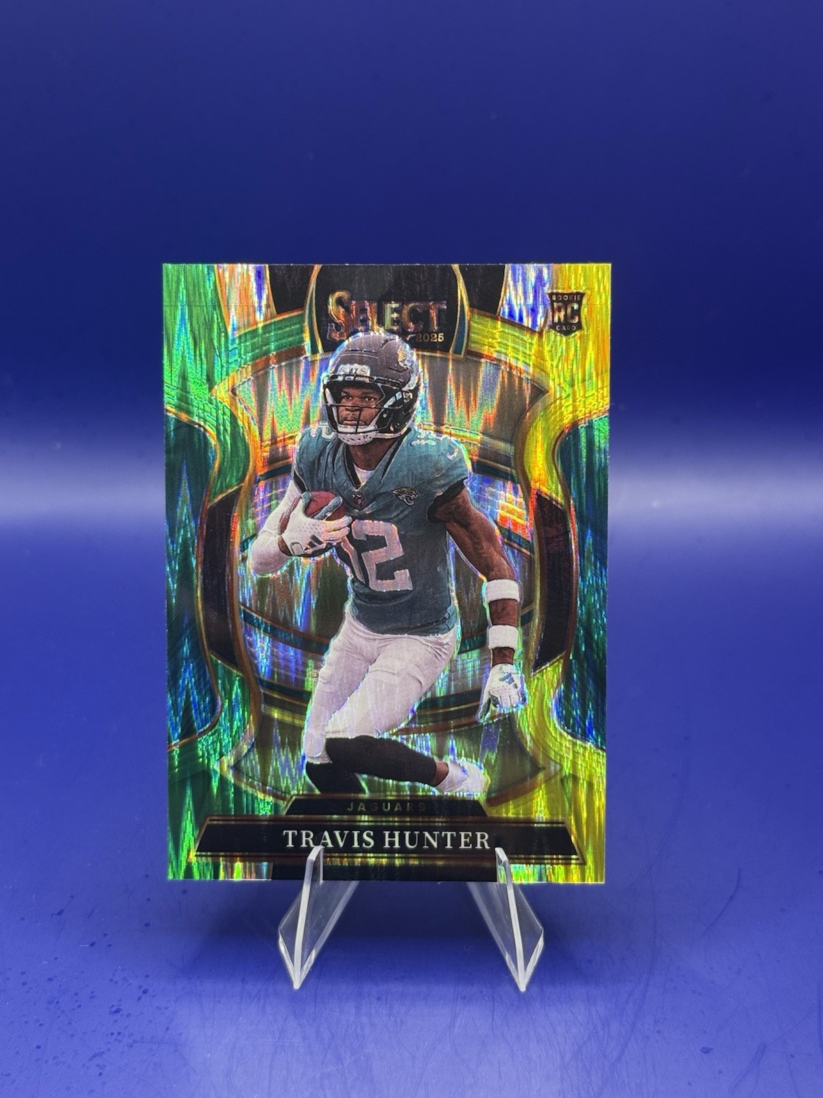 2025 Panini Select - Concourse Travis Hunter #28 Green & Yellow Shock Prizm (RC)