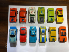12 Vintage Aurora AFX HO Slot Cars Lot $1.00