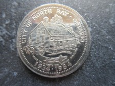 1984 North Bay Ontario Centennial Dollar Dionne Quintuplets