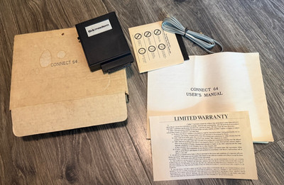 Vintage Commodore 64  Modem Cartridge with box and instructions UNTESTED