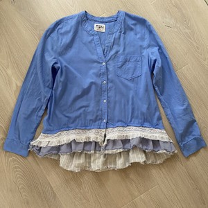 cream ruffle shirt