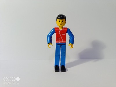 Lego tech040 Technic Figur blaue Beine rot oben Reißverschluss blaue Arme schwarze Haare
