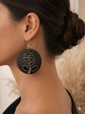 Black Circular Earrings with A Gold Etched Rose Design On The Back