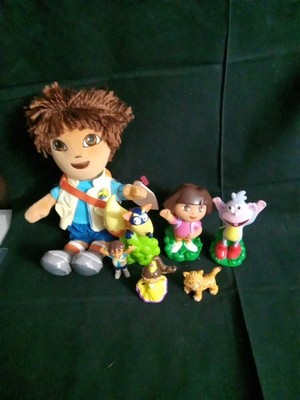 collection of Dora the Explorer and Diego plush and plastic toys 7 Items TY