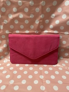 pink suede clutch