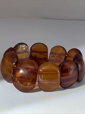 Antikes Bernstein Flexarmband,baltisch,cognac, 16.9g,D-5.3cm,1920-1930