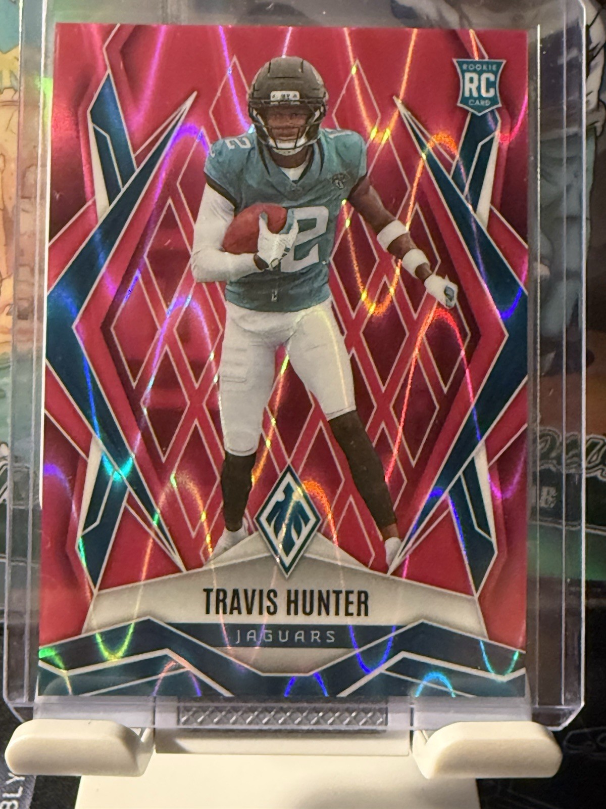 2025 Panini Phoenix Travis Hunter PINK SEISMIC ROOKIE  /75 (RC)  #157