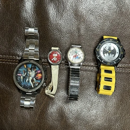 Watch Lot 1 Vintage Star Wars, Snoopy, Goofy And Batman Untested.  Read DESC