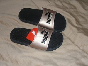 gold puma slides