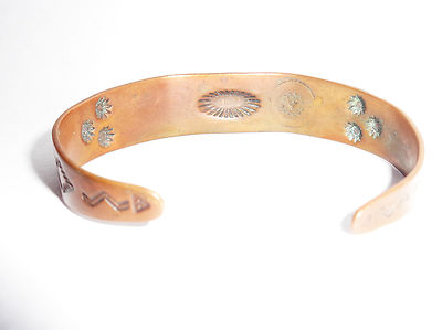 Vintage Navajo copper bracelet decorated with Thunderbird and