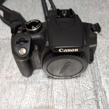 Canon EOS Kiss X10 Digital DSLR Camera with Strap and Lens Cap