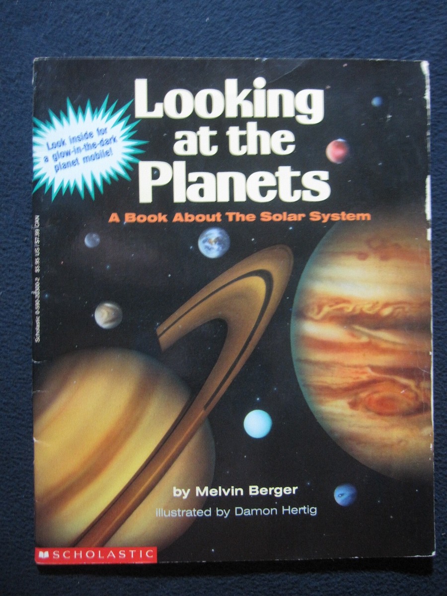 Looking at the Planets: A Book About the Solar System/With a Glow in the  Dark