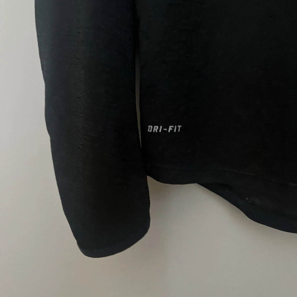 Camiseta deportiva Nike Quarter Zip Dri-Fit para mujer mediana negra manga larga Foto 2 de 4