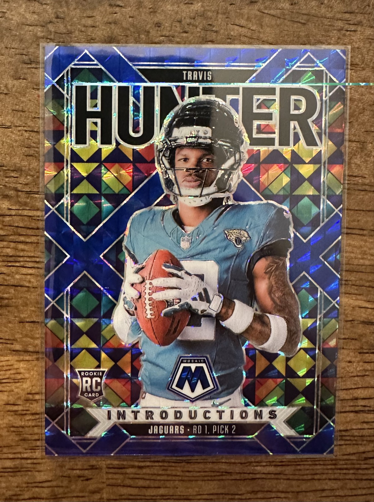 2025 Panini Mosaic - Introductions Travis Hunter #7 Blue Mosaic Prizm /99 (RC)