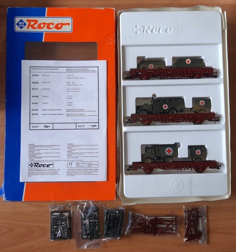 Escala H0 ROCO 44024 vagón con vehículos militares muy bueno en EMBALAJE ORIGINAL PRECIO ESPECIAL | Zustand: Gebraucht