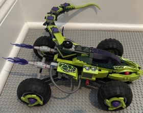 99% complete Lego Ninjago 9445 Fangpyre Truck Ambush - no minifigures