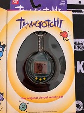 NIB Vintage Bandai Tamagotchi 1996-1997 1800 1st Generation - Translucent Blue