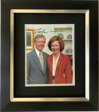 JIMMY CARTER AND ROSALYNN CARTER HAND SIGNED FRAMED PHOTO DISPLAY.