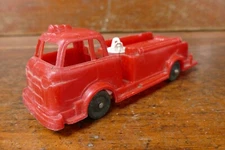 Vintage 1950s WYANDOTTE Toys Red Plastic Fire Tick - Fire Fighter USA 7 1/4”