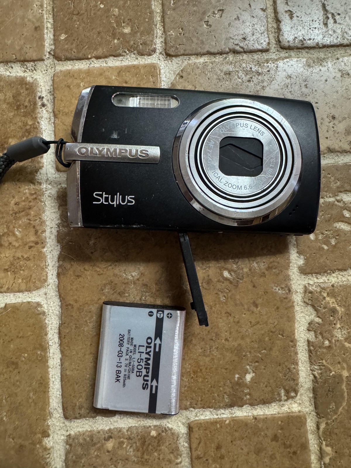 Olympus Stylus 1010 Digital Camera 10.1 MP 7x Zoom Black HyperCrystal LCD