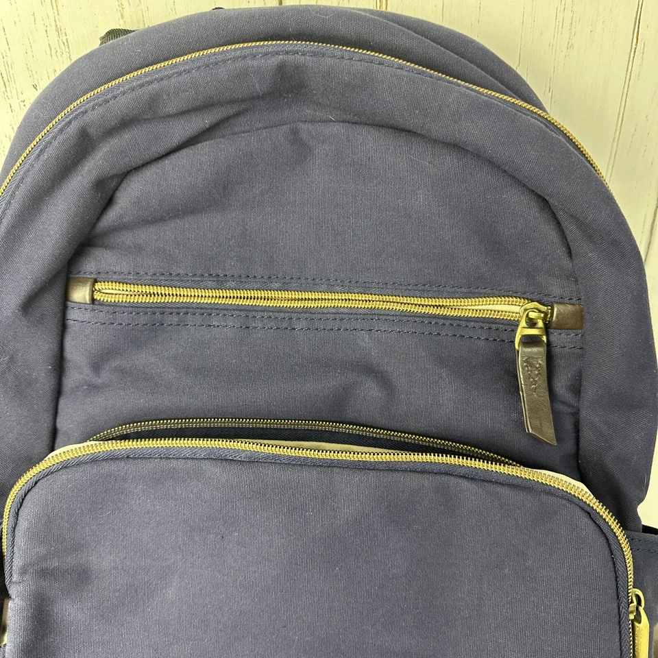 Mochila delgada Travelon antirrobo Courier - Lona azul marino - Cremalleras de bloqueo Foto 4 de 4