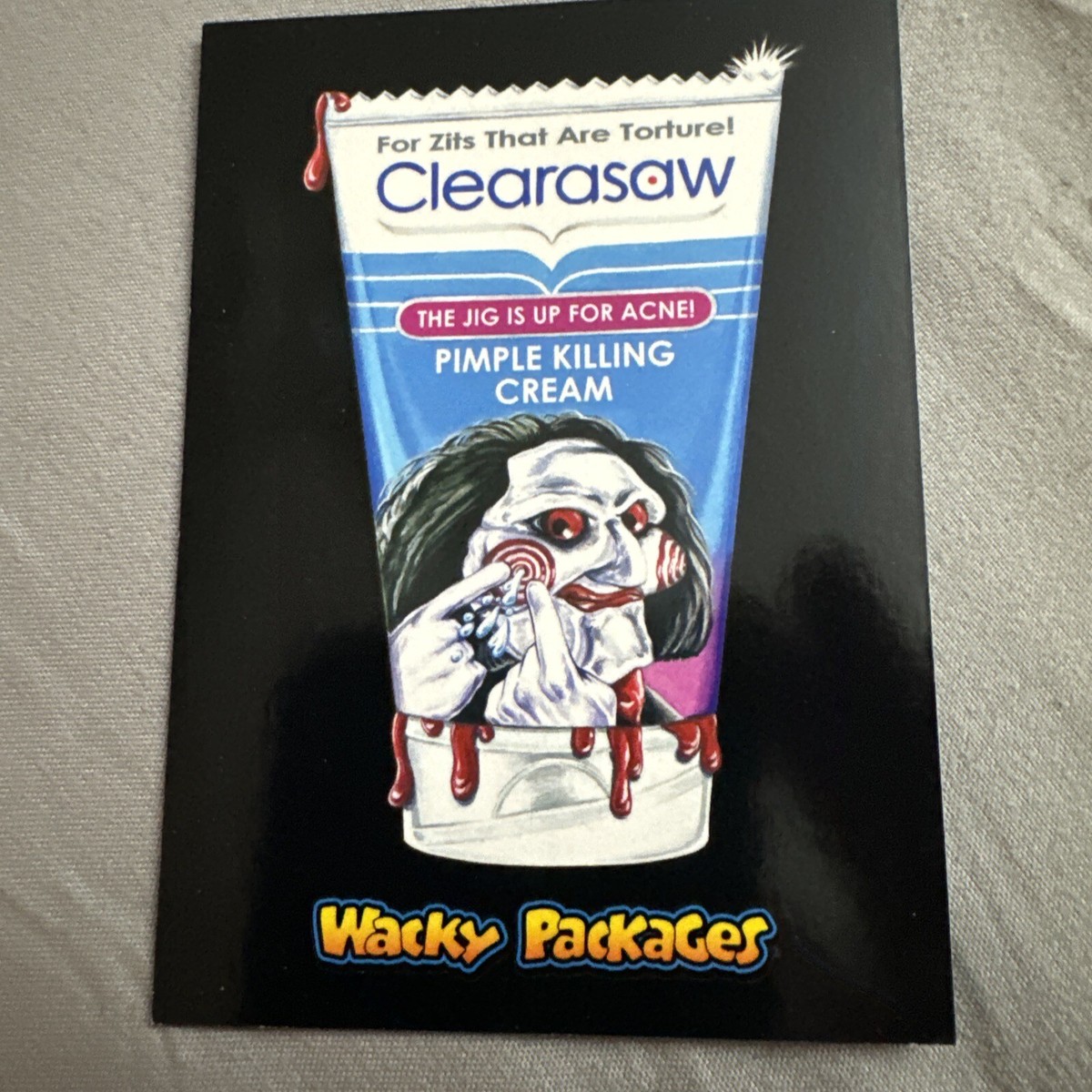 2018 TOPPS WACKY PACKAGES GO TO THE MOVIES Saw Jigsaw Horror