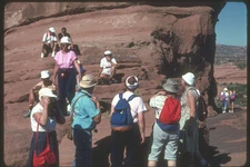 254081 Tourist At Delicate Arch A4 Photo Print