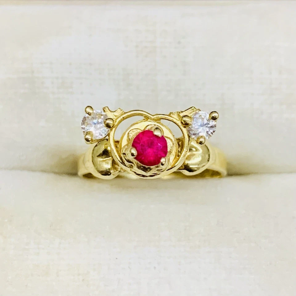 Anillo de boda giratorio de oro amarillo de 14k rubí rosa y corazón de flor circonita cúbica talla 3 Foto 2 de 4