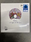 QUEEN A NIGHT AT THE OPERA WALMART EXCLUSIVE SKY BLUE VINYL RECORD IN HAND