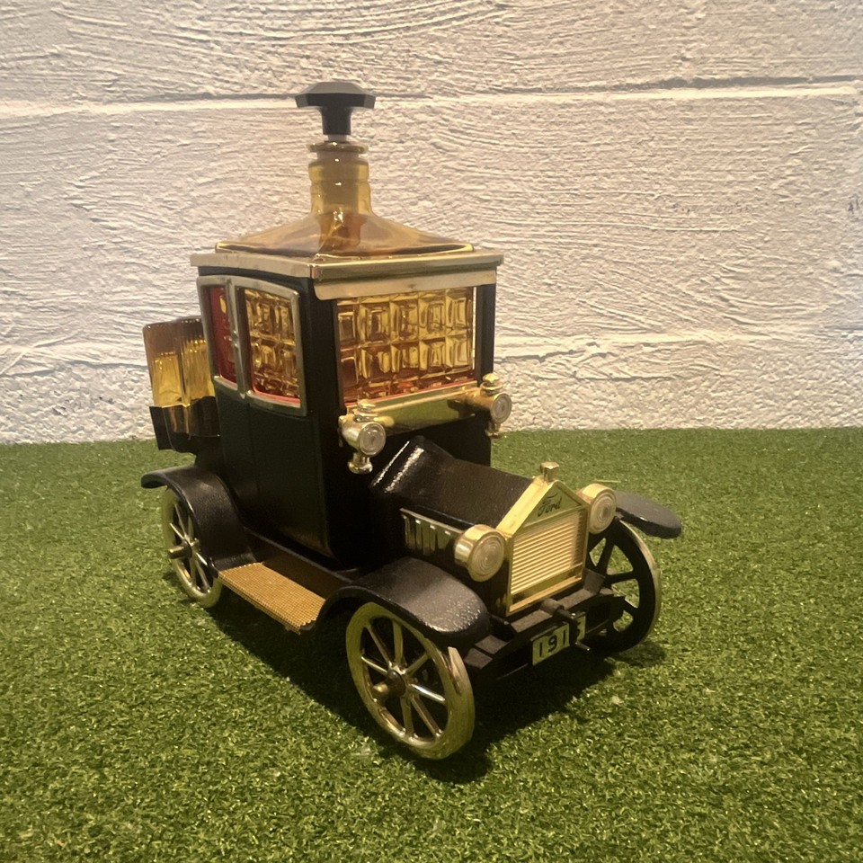 A Ford Model T shaped music box decanter set made in Japan — kitsch, nostalgic, and fully original, it's automotive and barware history in one weird little package.