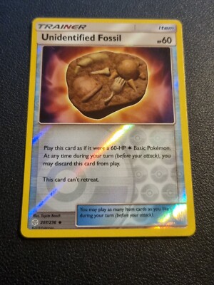REVERSE HOLO Pokemon Sun & Moon Cosmic Eclipse Card Unidentified Fossil 207/236
