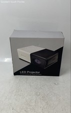 White Black 1080p Mini LED Projector With Box And Accessories Not Tested
