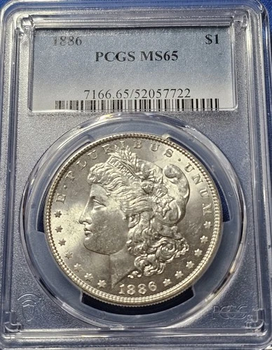 A 1886 $1 MORGAN SILVER DOLLAR PCGS MS 65 PHILADELPHIA MINT. BLAST WHITE