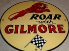 VINTAGE "ROAR WITH GILMORE GASOLINE" 11 3/4" PORCELAIN METAL OIL PUMP PLATE SIGN