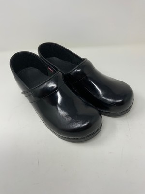 sanita black patent clogs