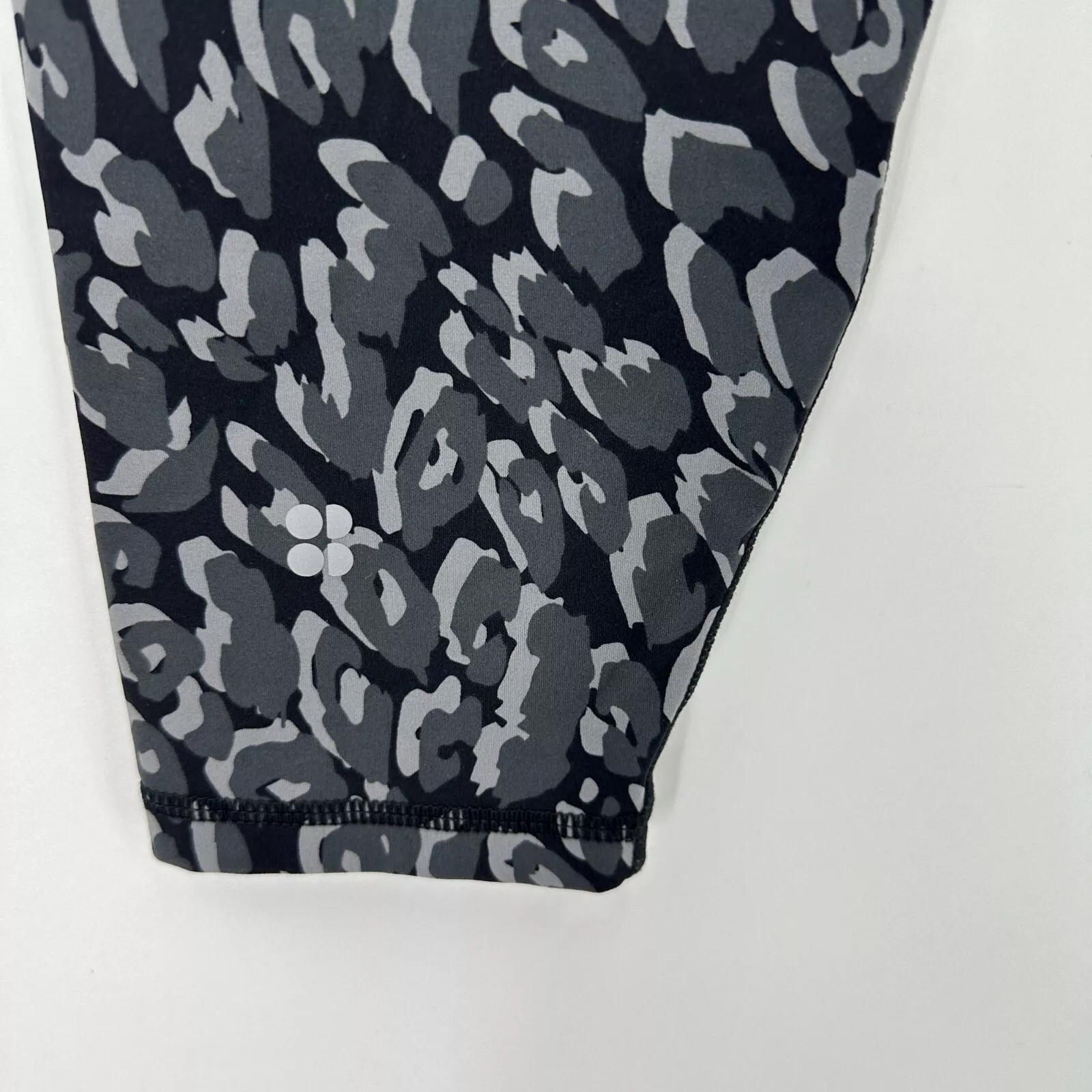 sweaty-betty power pull on 7/8 length animal print side pocket leggings
