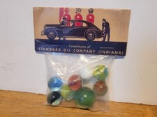 VINTAGE STANDARD OIL COMPANY REPRODUCTION ADVERTISING MARBLE PACKAGE #1