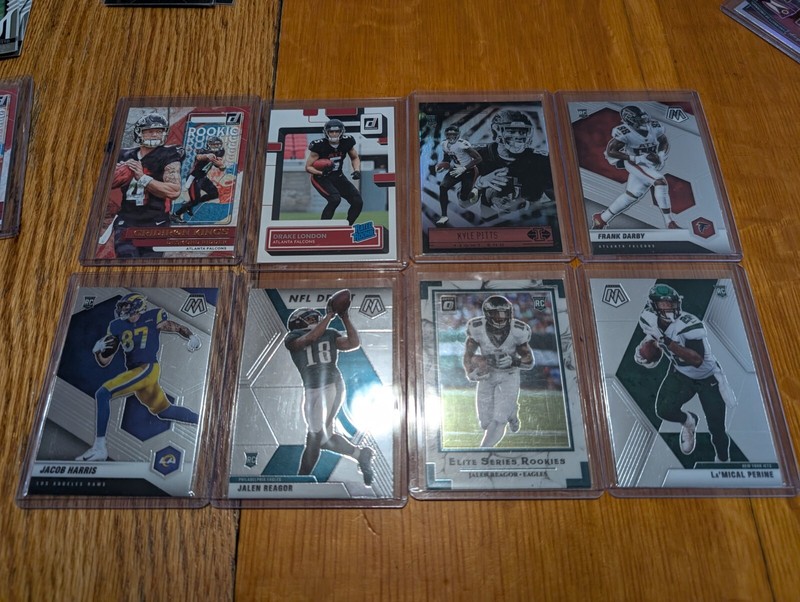Lot Of 8 NFL Sports Cards In Plastic Sleeves